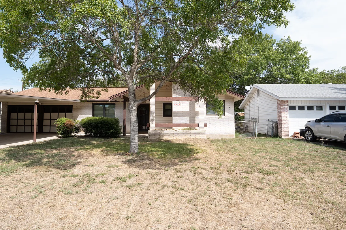 Building Photo - 5235 Happiness St