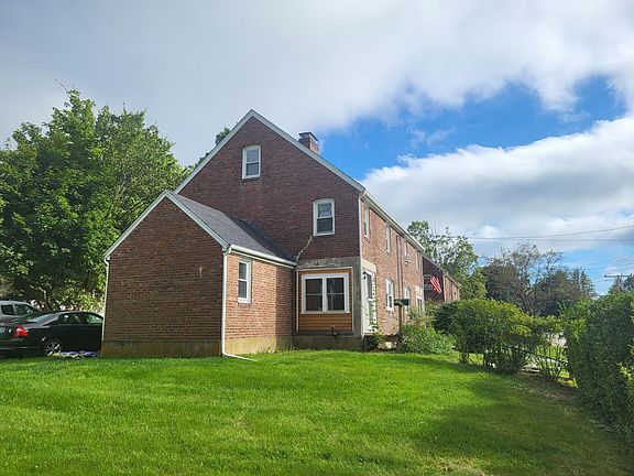 Side Yard Surrounded by privacy hedges.