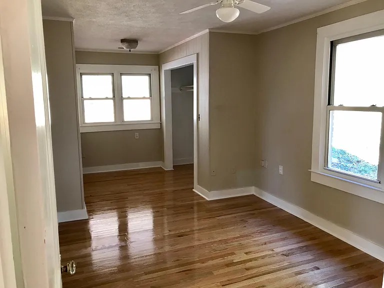 Bedroom 3. Closet on right. Bathroom 2 entrance to the left.