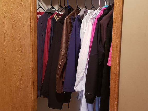 Coat closet in entryway 