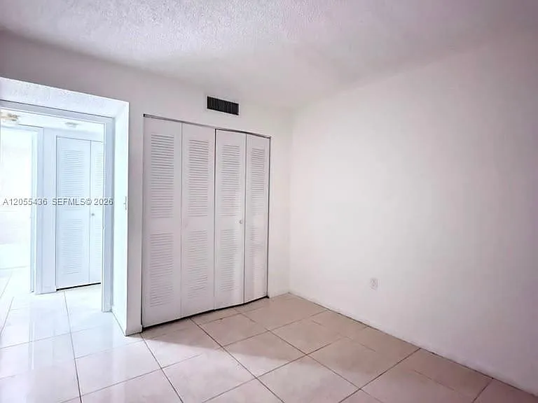 7090 NW 179th St #107 — Photo 11