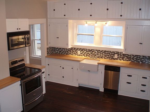 Butcher block counter tops, stainless appliances