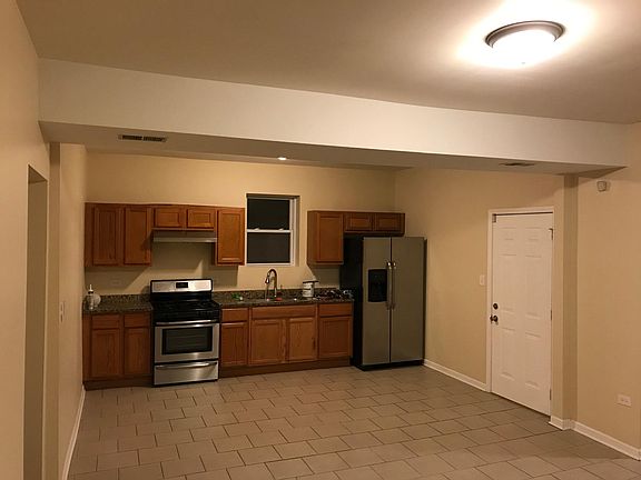 Very large kitchen (all stainless steel appliances).