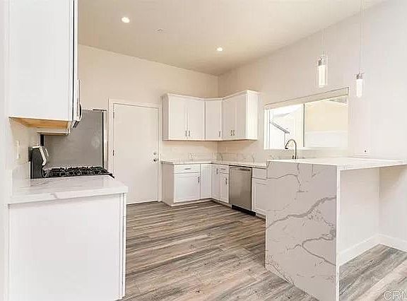Open Kitchen with gas utilities and bartop