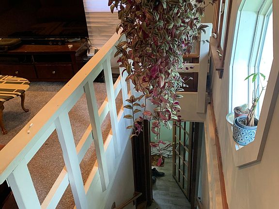 Entrance and stairs going up to apartment