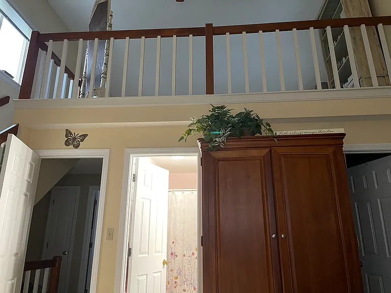So many possible uses for the loft above - it has been an office, work out space, and quiet, peaceful, reading space for me throughout the years.