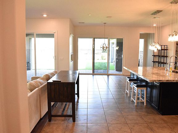 Extended Entry into Main Open Kitchen, Living, Dining, and Entertainment Area - Open Floorplan Design