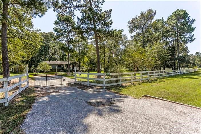 Gated Home on 2 fabulous acres.