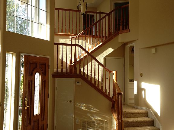 Stairway to large loft + 2 bedrooms