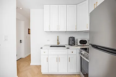 Rented by John W. Chang, LREB