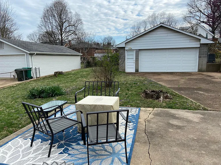 Backyard. Large two car garage