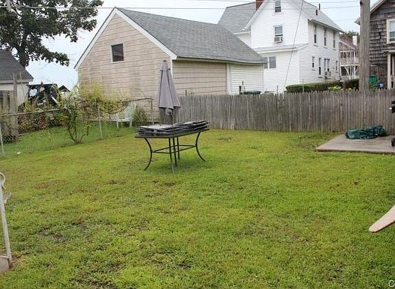 Private fenced in backyard