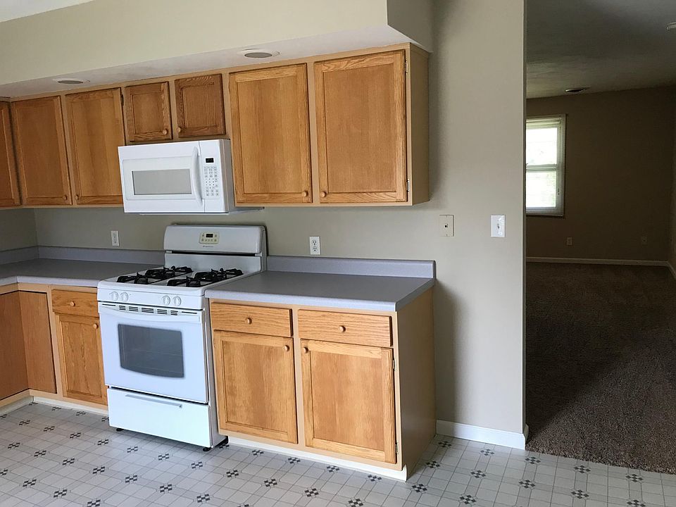 Kitchen view showing entrance to living room.