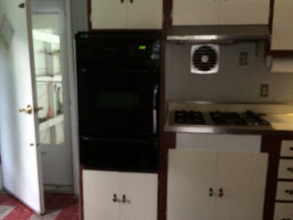 Kitchen with small eating area