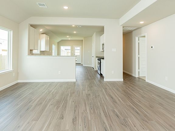 Family Room to Kitchen and Dining Area