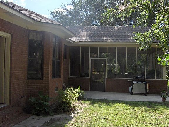 Screened back porch and open patio