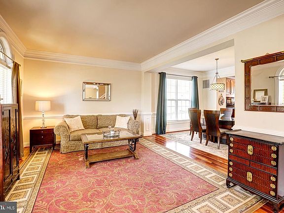 Formal living room opens to dining room