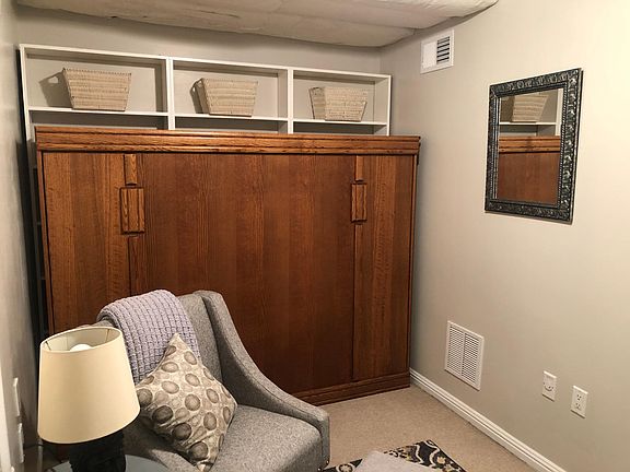 Wall bed and sitting area