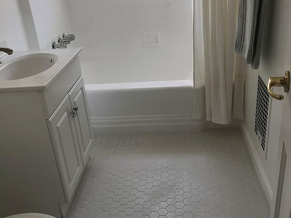 Bathroom - new tile floor and fixtures