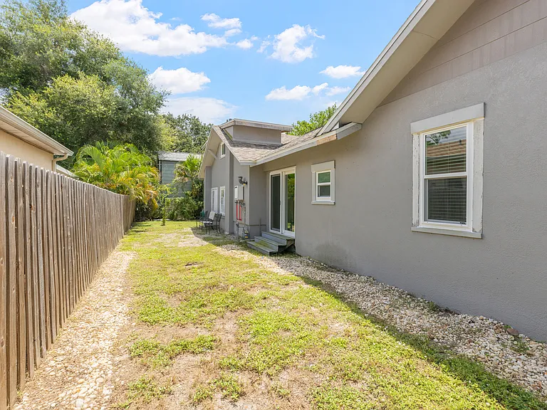 A shared fully fenced backyard offers privacy, security, and space to enjoy the outdoors.