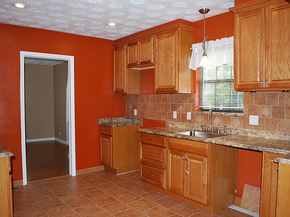 36" oak cabinets, tile floor