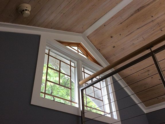 This upper floor bonus room is amazing! Light, warm and mode