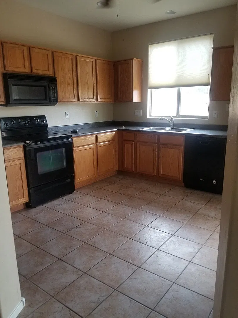Welcome to your spacious 4-bedroom home in Surprise — Photo 3