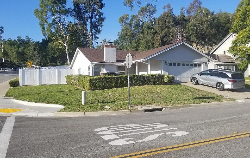 side view of the house and corner lot