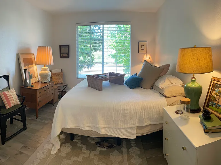 Serene primary includes 2 chairs, bench, small, tall side table near window, & a new king bed & base on order, along with new bedding. Images will be updated if possible! We will include 2 lamps & a new runner as well.