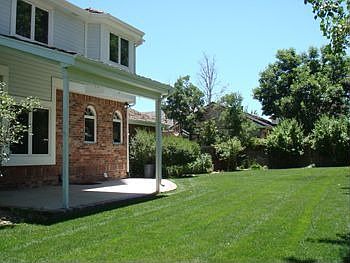large back yard with patio