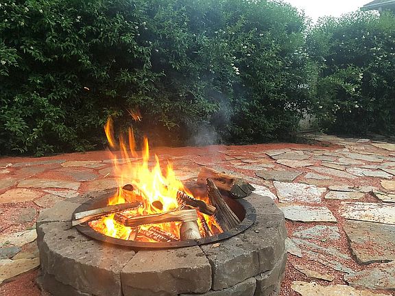 Fire pit with Privacy Shrubs