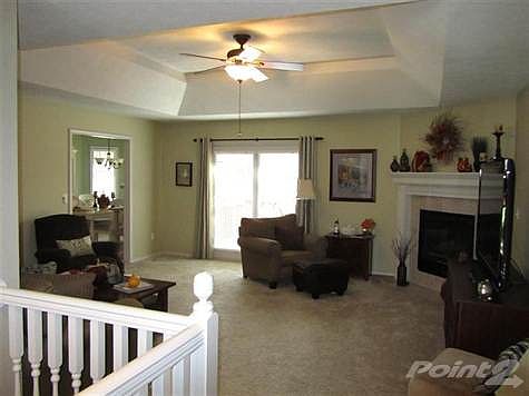 Spacious and bright Living Rom with gas fireplace.