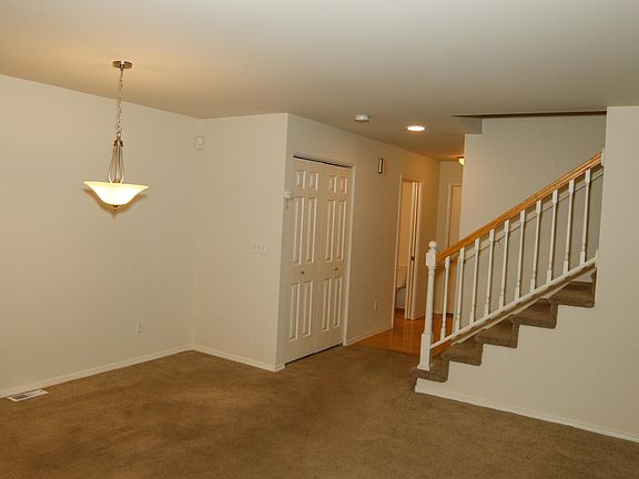 Dining room, guest closet and stair case