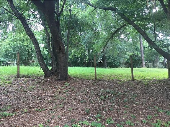 4th image of 6066 Highland Woods Dr N