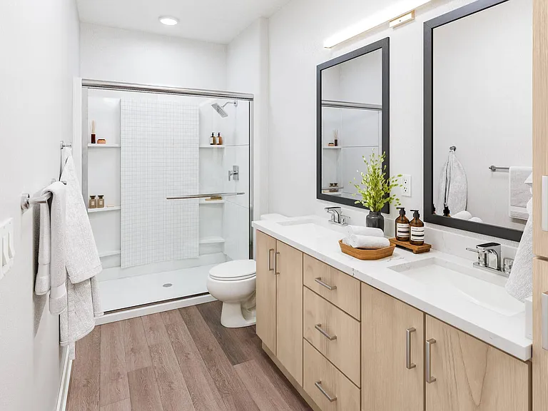 Bathroom with Walk-in Shower and Double Vanities