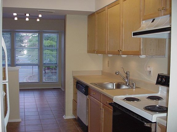 Kitchen is right off the separate dining room.