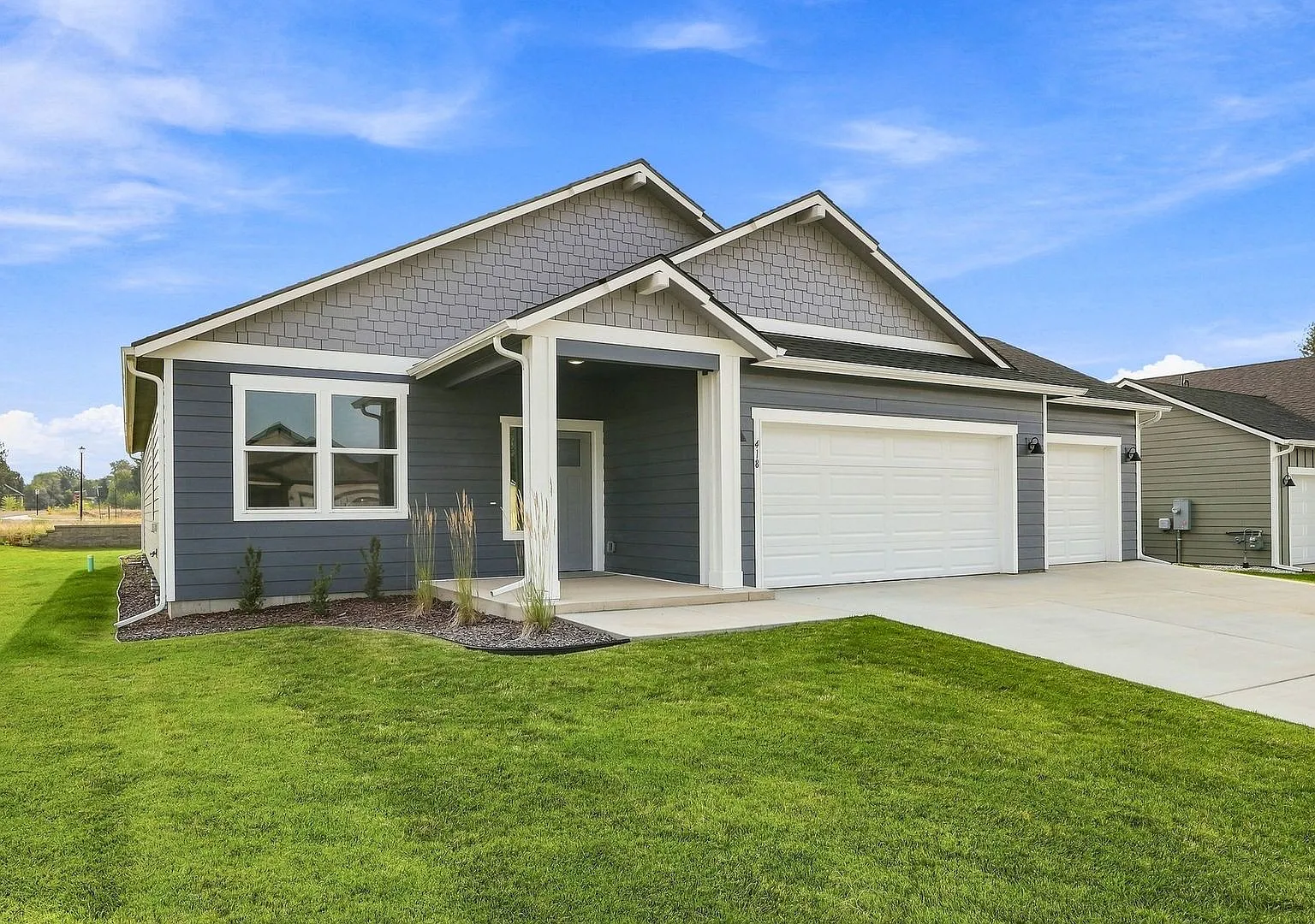 Modern 4-Bedroom Home with a 3-Car Garage & Covered Patio — Photo 2