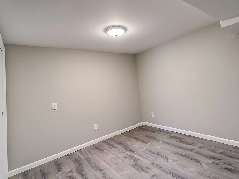 4th bedroom / flex room located on lower level
