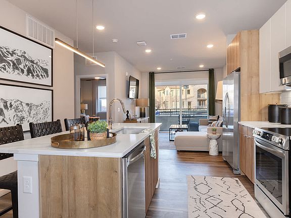 Kitchen with Stainless Steel Appliances and Quartz Countertops
