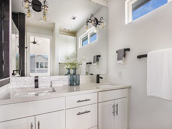 Primary bathroom with walk in shower and lots of storage