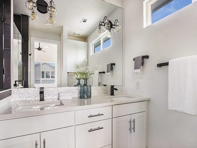Primary bathroom with walk in shower and lots of storage