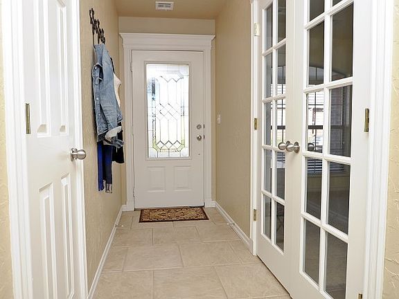 Bright entry with tile floor