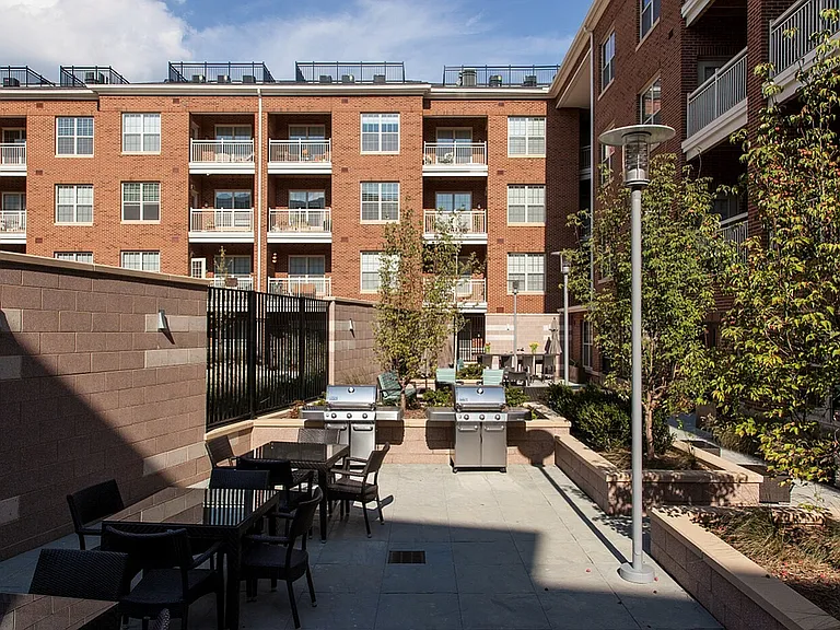 Urban Courtyard With BBQ & Seating Areas