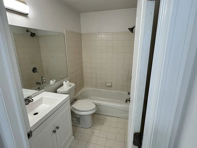 upstairs hall bath next to two bedrooms