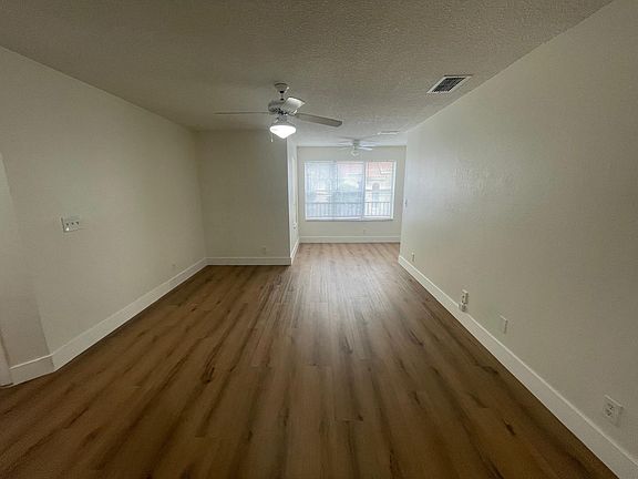 4th image of 3460 Pinewalk Dr N #1