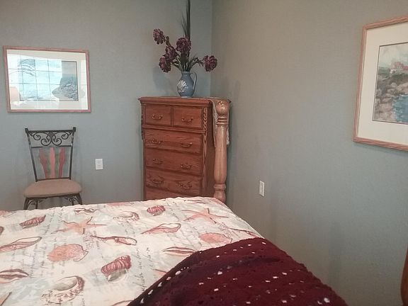 Partial view of bedroom in suite #1.