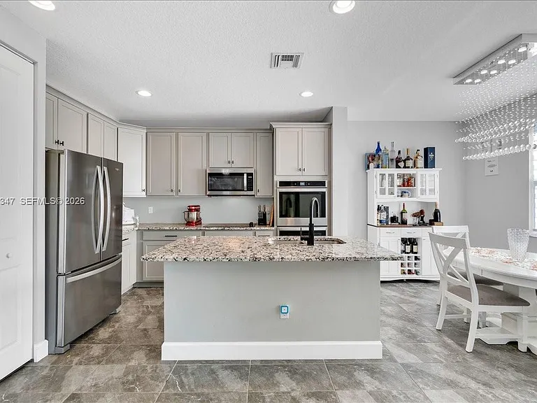 3392 NW 5th St — Photo 13