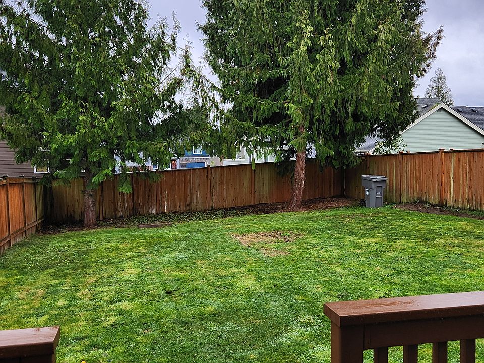 Large fenced backyard.