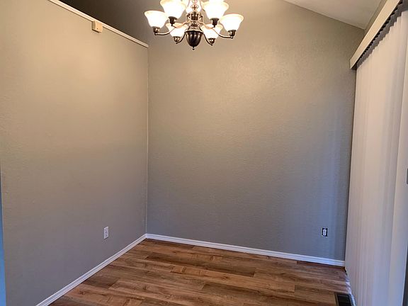 Living room nook (to the left of the fireplace, opens on to deck.