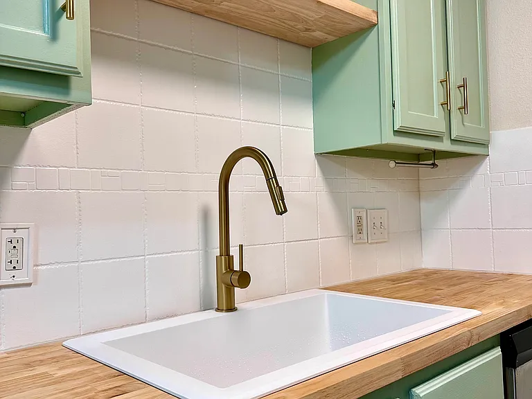 modern fixtures and deep farmhouse sink